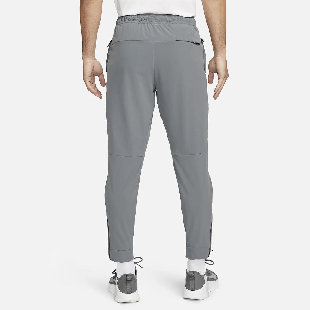 Nike Dri-FIT Unlimited Men&#039;s Tapered Leg Versatile Pants FB7548-084
